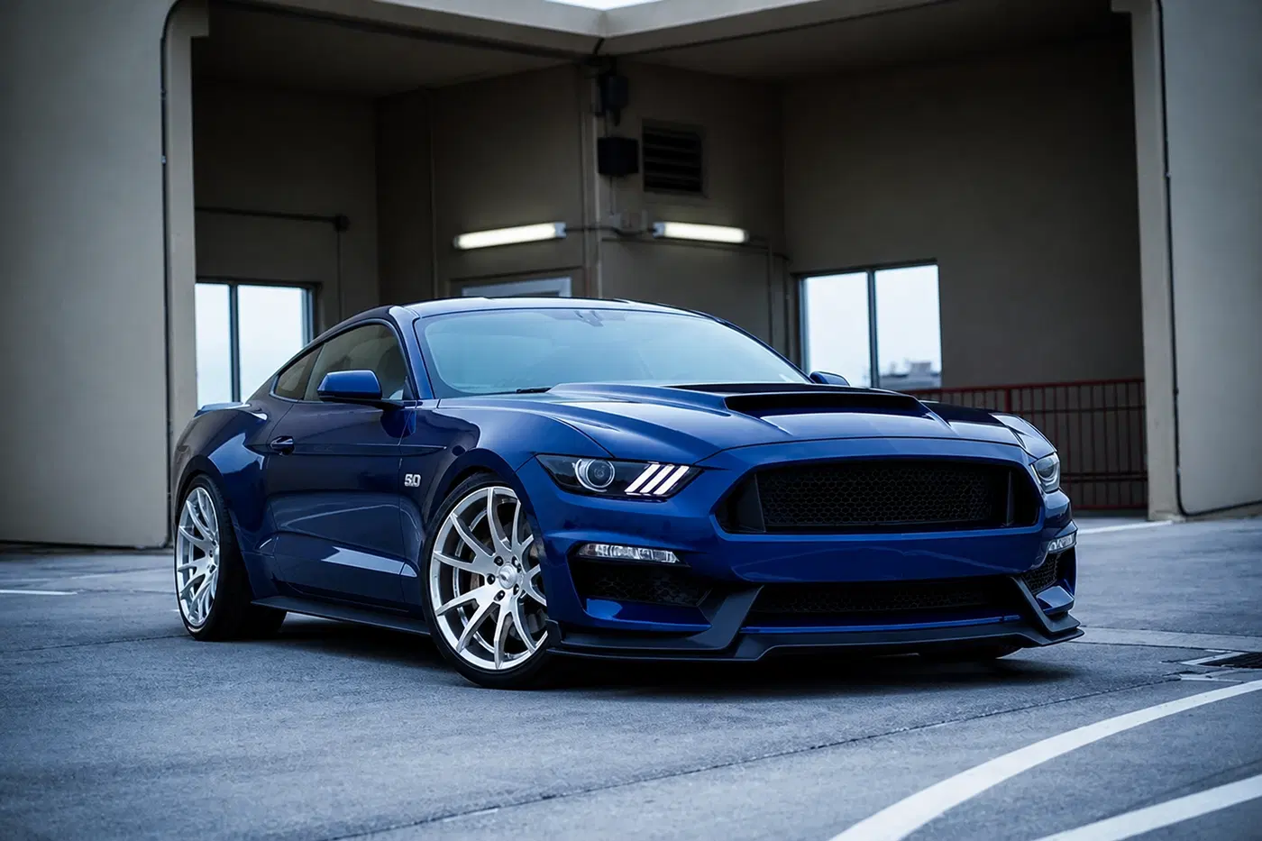 AI-generated view of a 2016 Ford Mustang GT with Outlaw N/A wheels