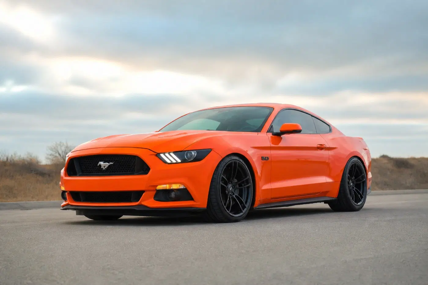 AI-generated view of a 2016 Ford Mustang GT with P51 101RF wheels