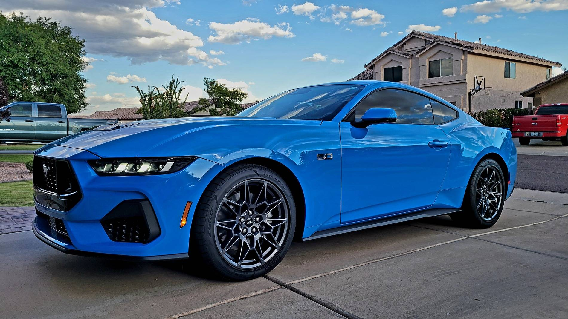 AI-generated view of a 2024 Ford Mustang GT Premium with Ford OEM Performance Package wheels