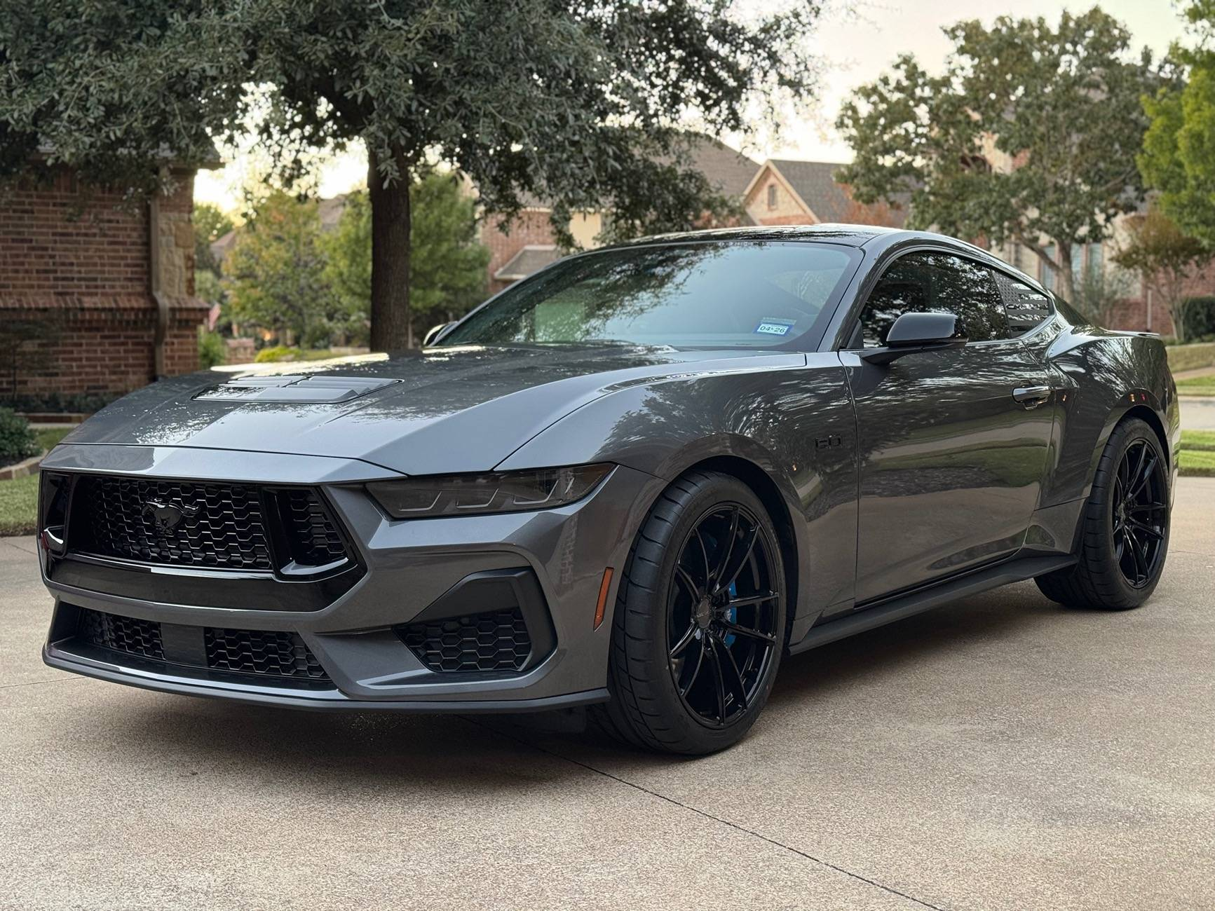 AI-generated view of a 2024 Ford Mustang GT Premium with Velgen VF5 wheels