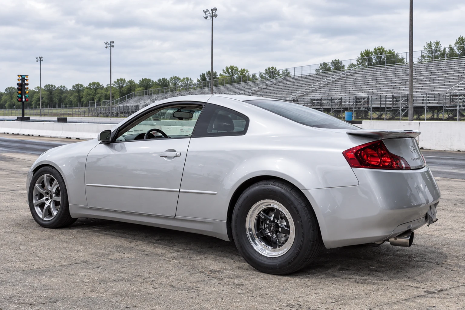 AI-generated view of a 2003 Infiniti G35 Coupe with Weld Racing RTS S71 wheels