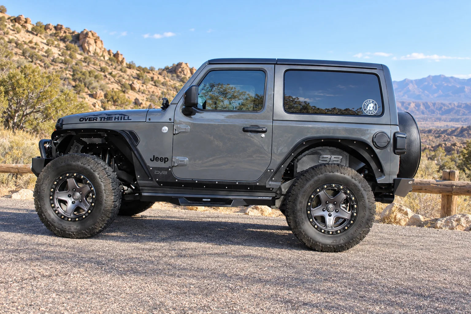 AI-generated view of a 2019 Jeep Wrangler Sport S 2-Door with American Racing ATX Ravine wheels