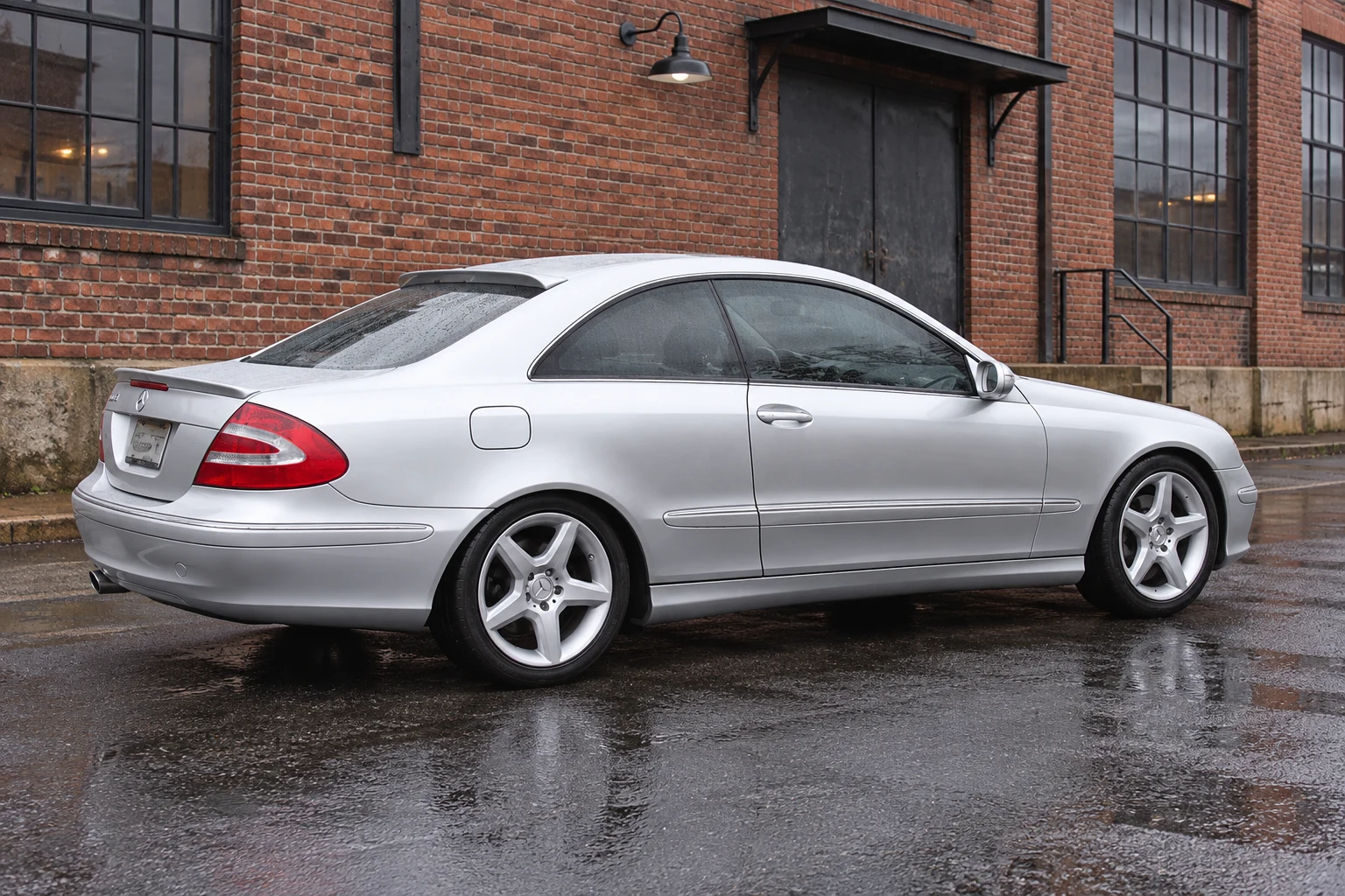 AI-generated view of a 2004 Mercedes-Benz CLK320 Coupe with Mercedes-Benz CLS AMG Replicas wheels