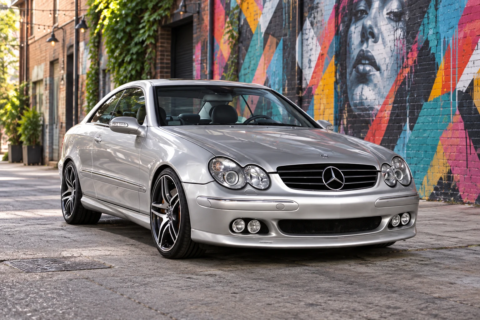 AI-generated view of a 2004 Mercedes-Benz CLK500 Coupe with Avant Garde AMG Replicas wheels