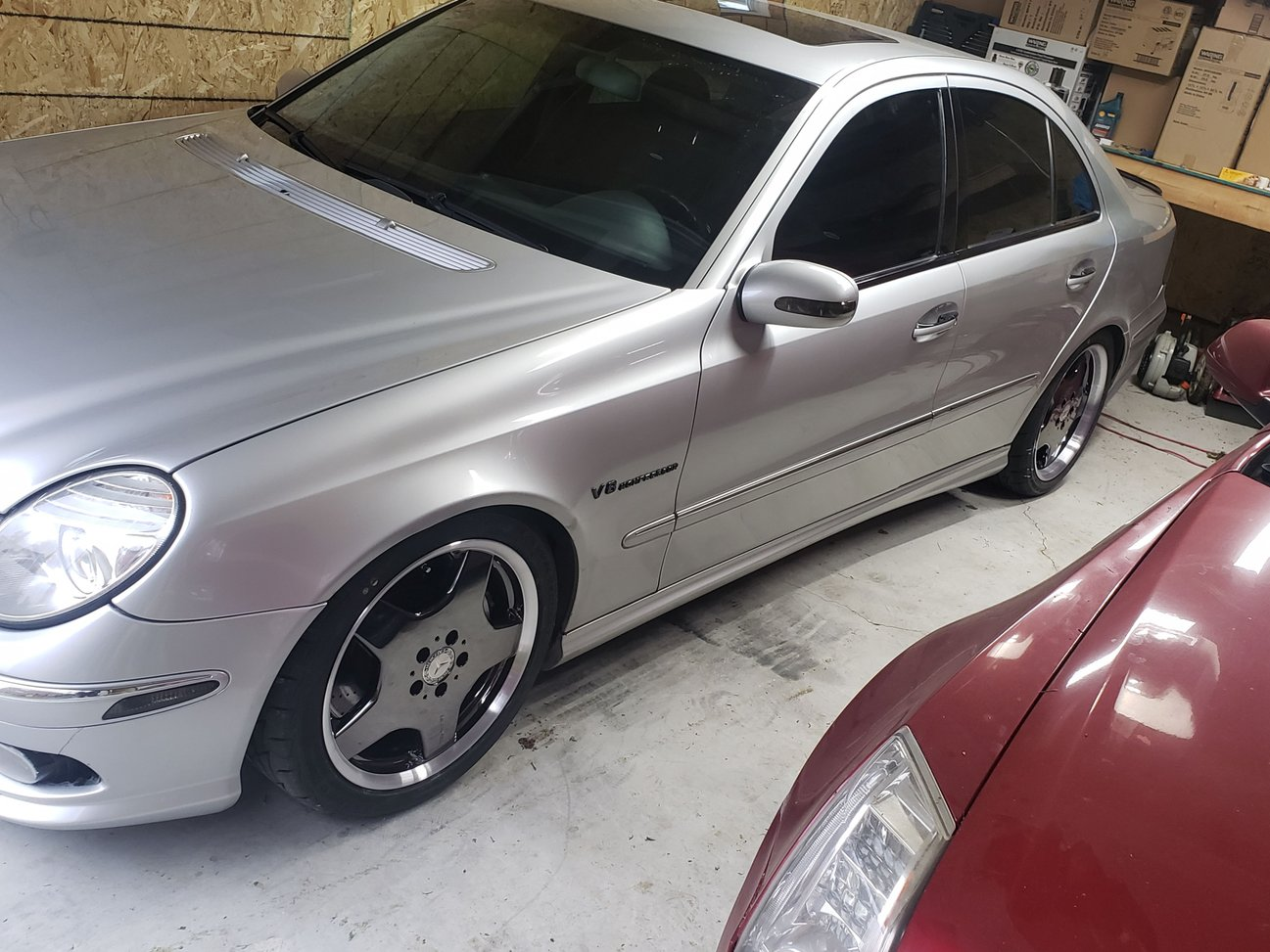 AI-generated view of a 2004 Mercedes-Benz E55 AMG Sedan with Mercedes-Benz S55 AMG Monoblock wheels