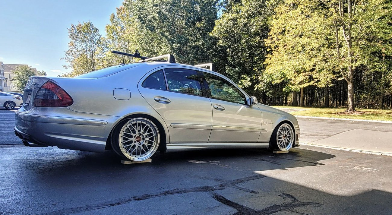AI-generated view of a 2004 Mercedes-Benz E55 AMG Sedan with BBS LM wheels