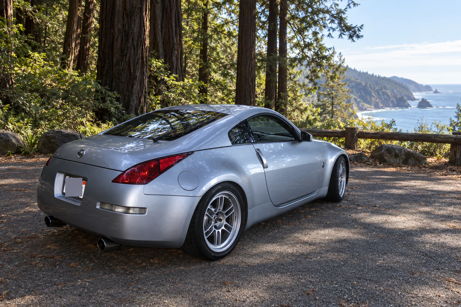 AI-generated view of a 2003 Nissan 350Z Enthusiast with Enkei RPF1 wheels