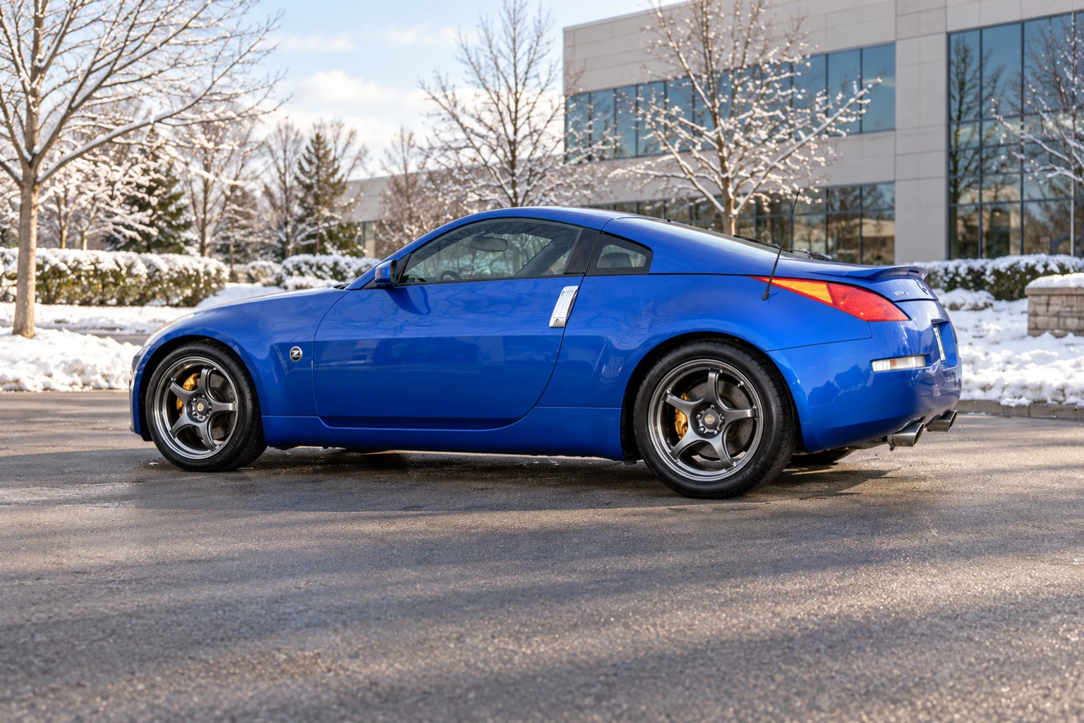 AI-generated view of a 2003 Nissan 350Z Track with 5Zigen FN01R-C wheels