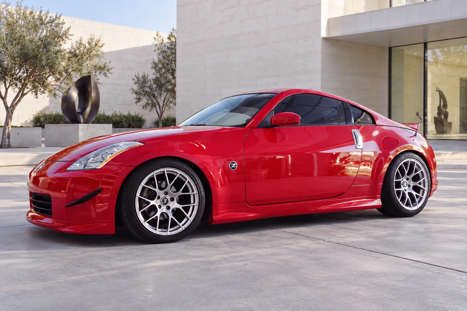 AI-generated view of a 2005 Nissan 350Z Enthusiast with Enkei Raijin wheels