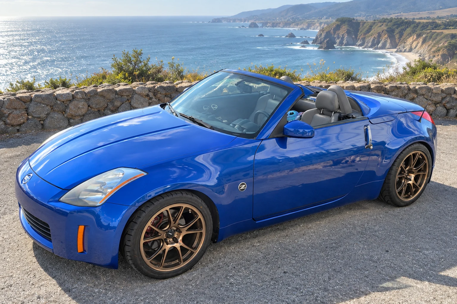 AI-generated view of a 2005 Nissan 350Z Touring Roadster with Konig Freeform wheels