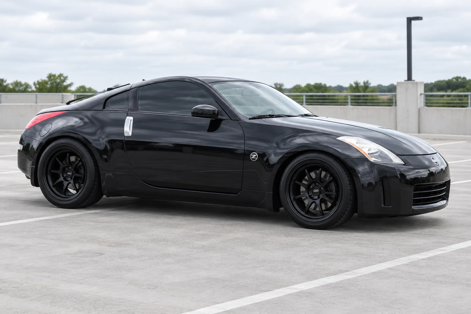 AI-generated view of a 2008 Nissan 350Z with Enkei RPF1 wheels