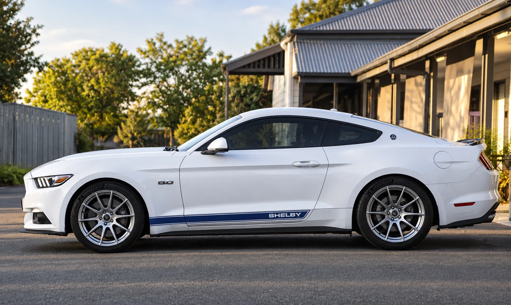 AI-generated view of a 2017 Ford Mustang GT with Shelby Venom wheels