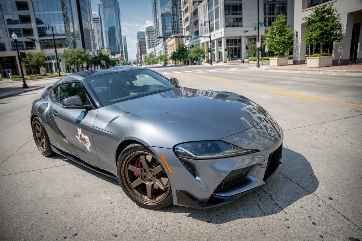 AI-generated view of a 2022 Toyota GR Supra with Volk Racing TE37 Ultra M-Spec wheels